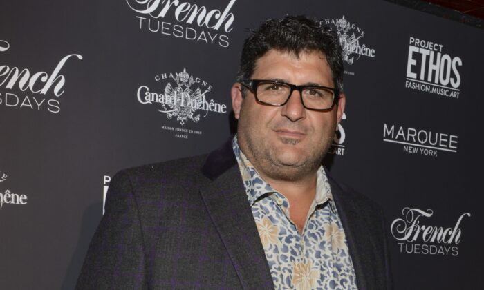 Football player Tony Siragusa attends the Sachika By To-Tam & To-Nya Sachika fashion show during Mercedes-Benz Fashion Week Spring 2015 at Marquee in New York on Sept. 9, 2014. (Vivien Killilea/Getty Images)