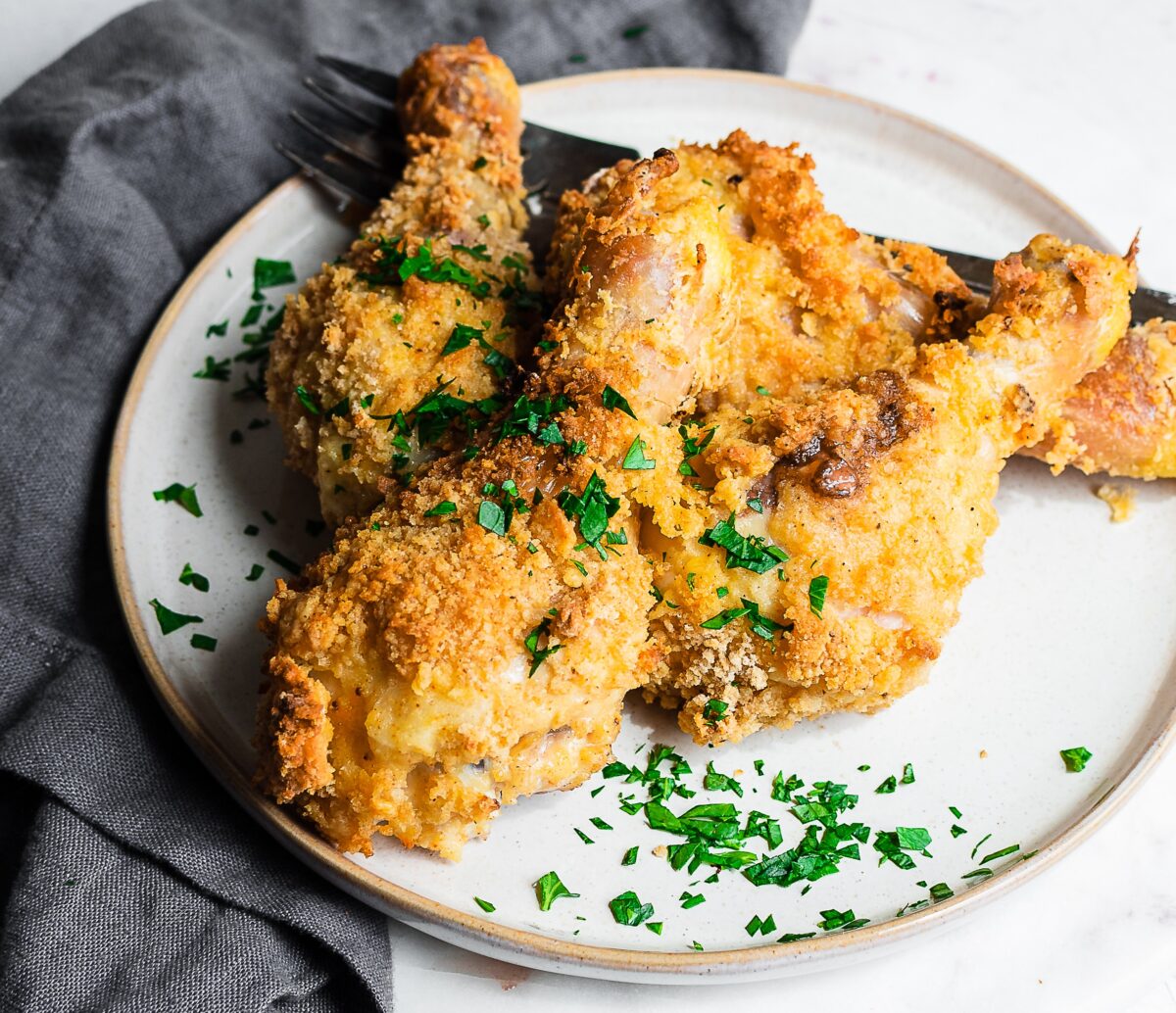 Easy to pack and easier to eat, fried chicken drumsticks are a family favorite.(Jennifer McGruther)
