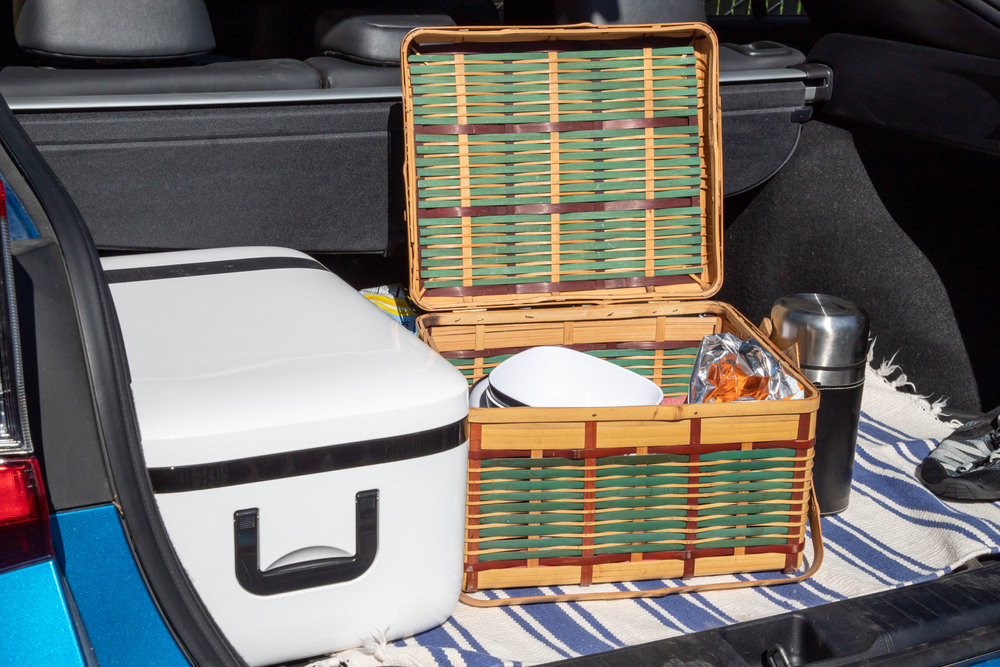 Picnic,Basket,With,Snacks,And,A,Cooler,In,The,Trunk