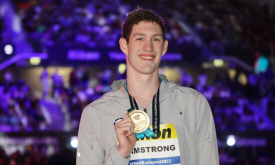 American Armstrong Takes 50m Backstroke Gold, McIntosh Wins 400m Medley