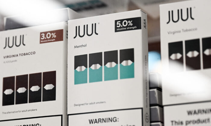 Juul Labs Inc. Virginia tobacco and menthol flavored vaping e-cigarette products are displayed in a convenience store in El Segundo, Calif., on June 23, 2022. (Patrick T. Fallon/AFP via Getty Images)