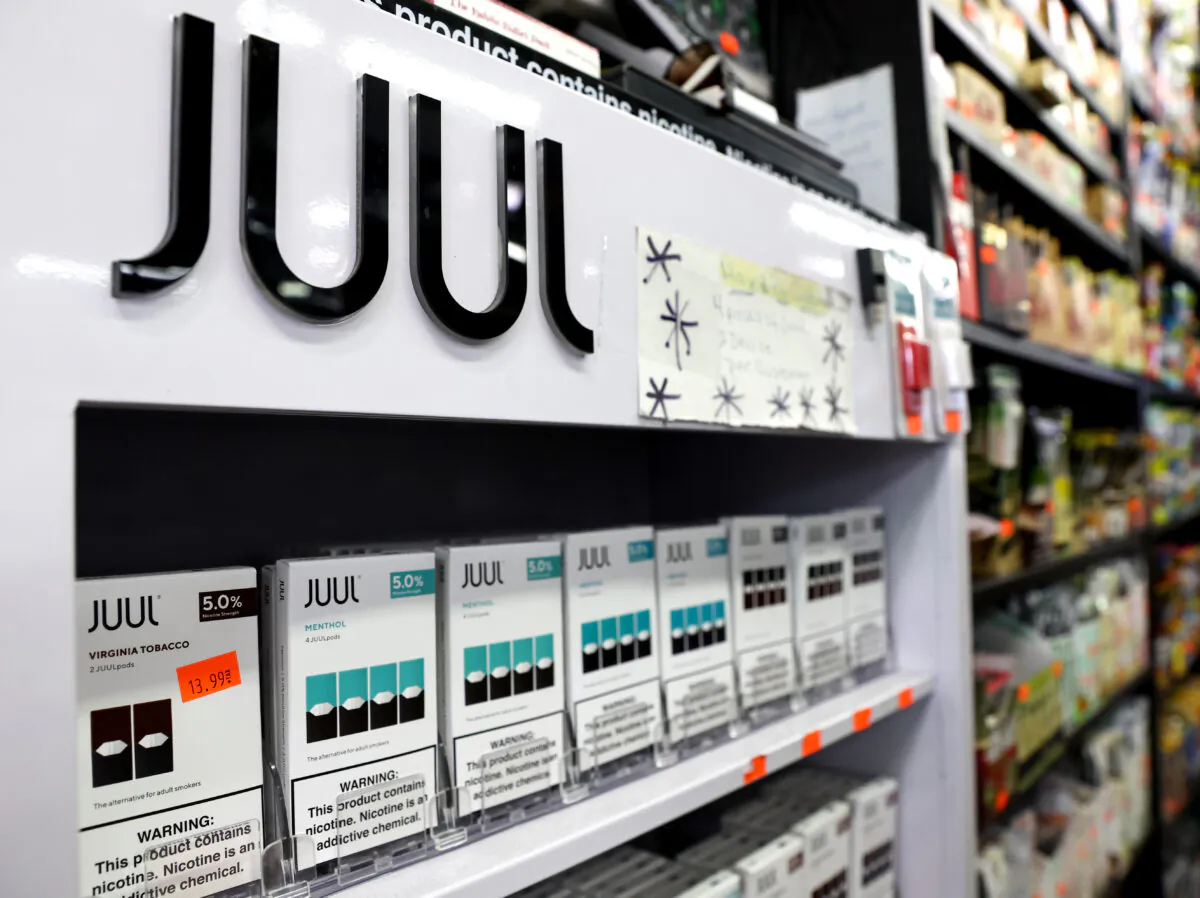 Packages of Juul e-cigarettes are displayed for sale in the Brazil Outlet shop in Los Angeles, Calif., on June 22, 2022. (Mario Tama/Getty Images)