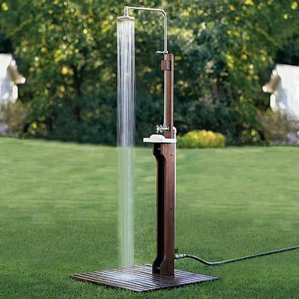 A modest freestanding shower unit hooks up to a garden hose outside. (Wayfair.com/TNS)