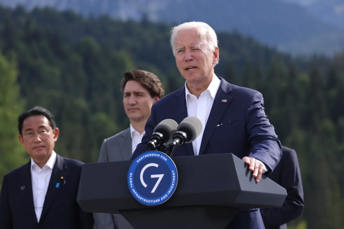 U.S. President Joe Biden speaks at the "Global Infrastructure" side event as Prime Minister of Japan Fumio Kishida and Canadian Prime Minister Justin Trudeau look on during the G-7 summit at Schloss Elmau near Garmisch-Partenkirchen, Germany, on June 26, 2022. (Sean Gallup/Getty Images)