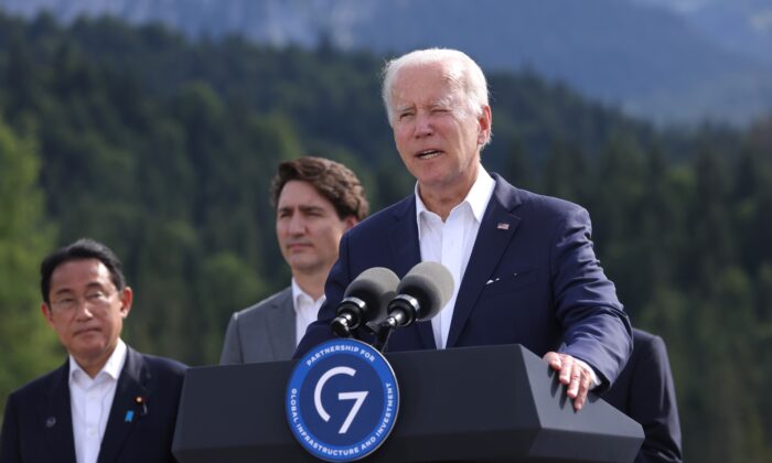 U.S. President Joe Biden speaks at the "Global Infrastructure" side event as Prime Minister of Japan Fumio Kishida and Canadian Prime Minister Justin Trudeau look on during the G-7 summit at Schloss Elmau near Garmisch-Partenkirchen, Germany, on June 26, 2022. (Sean Gallup/Getty Images)