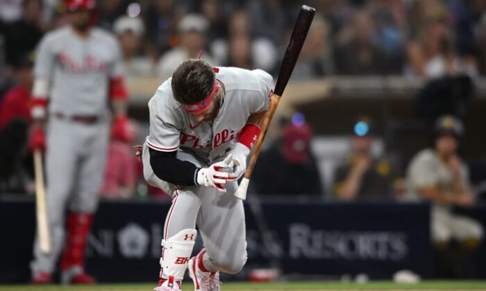 Philadelphia Phillies designated hitter Bryce Harper (3) reacts after being hit by a pitch during the fourth inning against the San Diego Padres at Petco Park in San Diego on June 25, 2022. (Orlando Ramirez/USA TODAY Sports via Field Level Media)