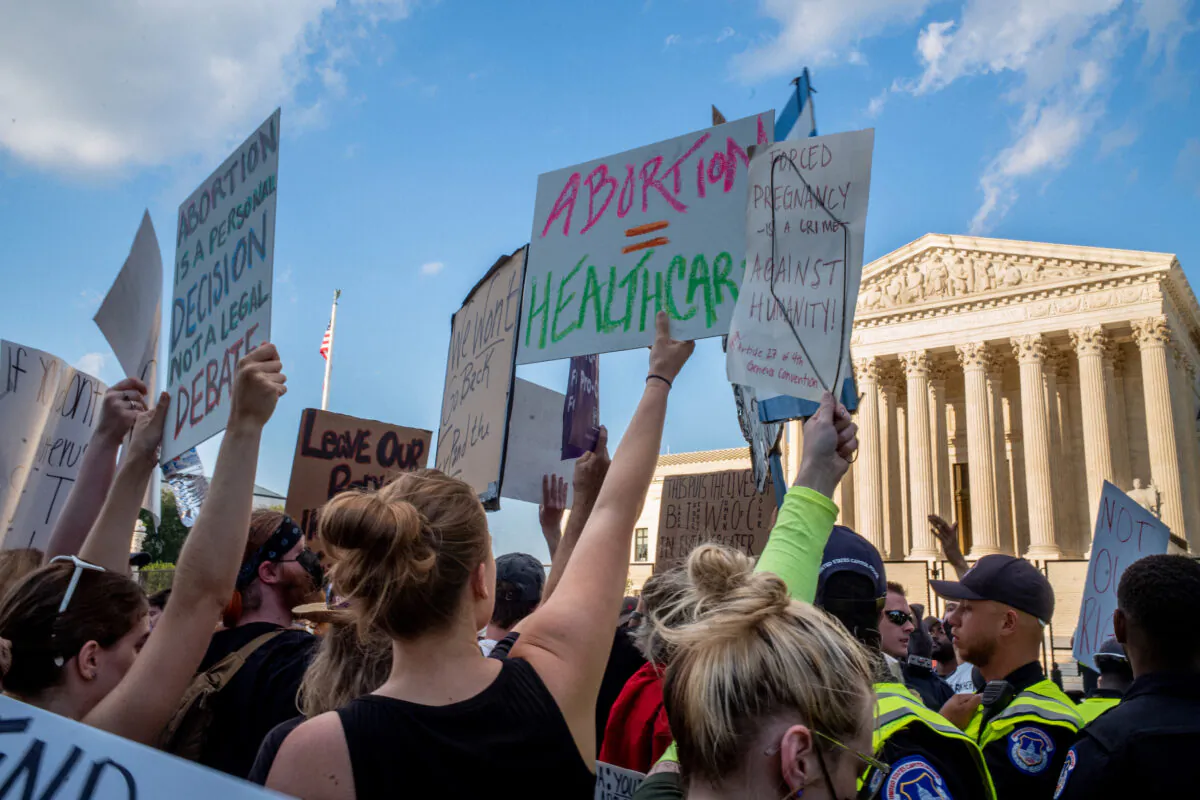 Abortion-rights demonstrators protest in front of the Supreme Court building in Washington following the announcement to the Dobbs v. Jackson Women's Health Organization ruling on June 25, 2022.  (Brandon Bell/Getty Images)