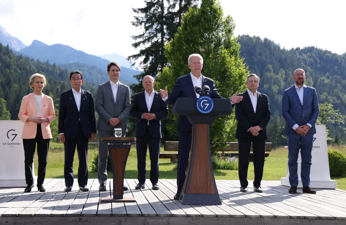 U.S. President Joe Biden (R-3) speaks at the "Global Infrastructure" side event as (L-R) European Union Council Commission President Ursula von der Leyen, Prime Minister of Japan Fumio Kishida, Canadian Prime Minister Justin Trudeau, German Chancellor Olaf Schulz, Prime Minister of Italy Mario Draghi, and EU Council President Charles Michel look on during the G-7 summit at Schloss Elmau near Garmisch-Partenkirchen, Germany, on June 26, 2022. (Sean Gallup/Getty Images)