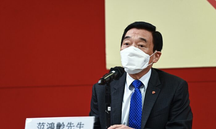 Hospital Authority Chairman Henry Fan Hung-ling at the HA meeting on June 23, 2022. (Song Bi-long/Epoch Times)