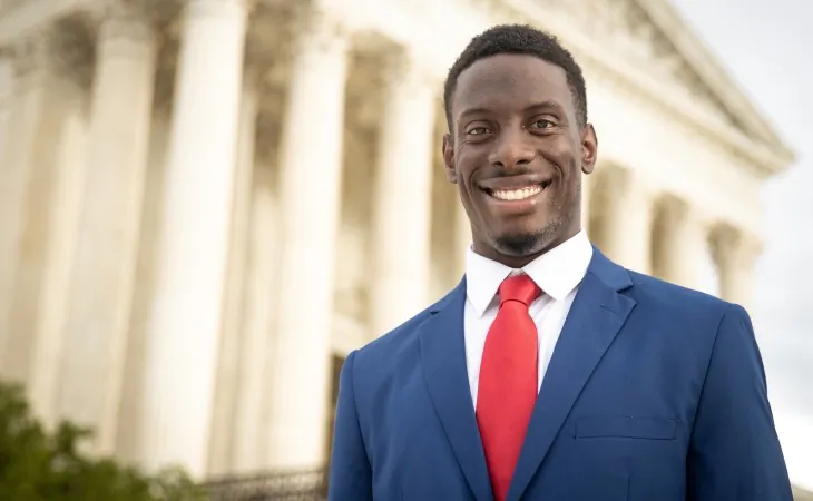 Litigant Chike Uzuegbunam in front of the Supreme Court in an undated photograph. (Courtesy: Alliance Defending Freedom)