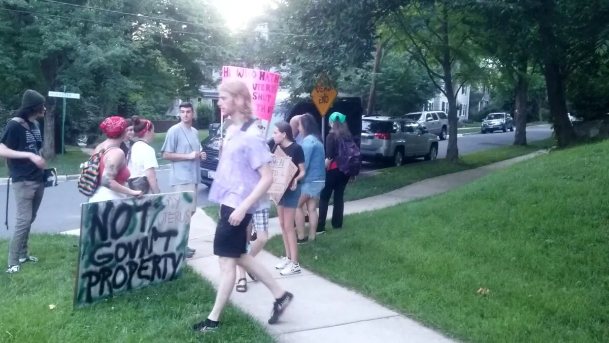 Pro-abortion protesters demonstrate near Chief Justice Roberts' house after a protest at Justice Brett Kavanaugh's house near Washington, D.C., on June 25, 2022. (Nathan  Worcester/The Epoch Times)