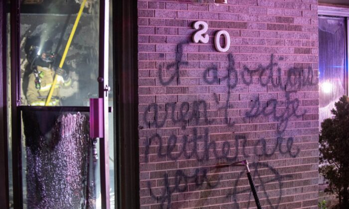 A message written on the wall of a Christian pregnancy resource center that was set on fire in Longmont, Colo., on June 25, 2022. (Longmont Police Department)