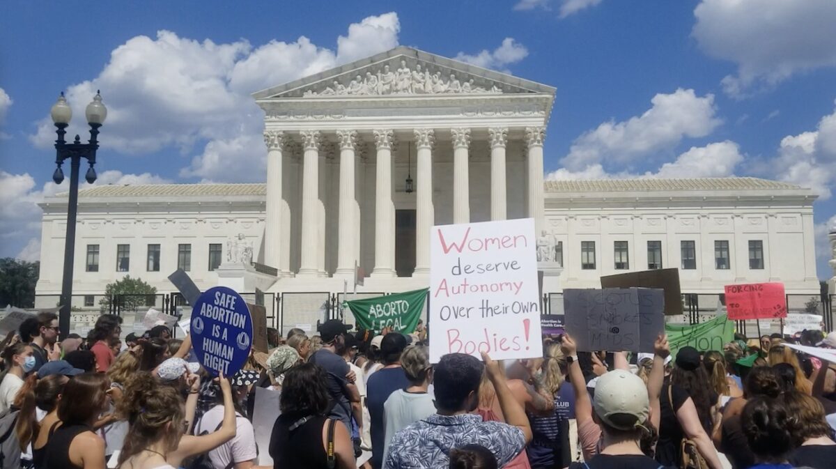 Protesters gather outside Supreme Court in a rally against the June 24 decision that repealed the 1973 Roe v. Wade ruling on June 25, 2022. (Nathan Worcester/The Epoch Times)
