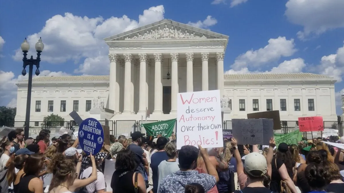 Protesters gather outside Supreme Court in a rally against the June 24 decision that repealed the 1973 Roe v. Wade ruling in Washington on June 25, 2022. (Nathan Worcester/The Epoch Times)