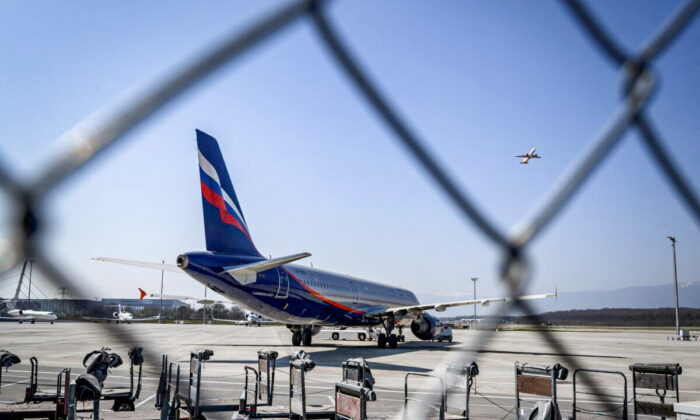 An Airbus A321-211 aircraft of Russian airline Aeroflot with registration VP-BOE is seen in the long term parking for planes of Geneva Airport on March 25, 2022.  (FABRICE COFFRINI/AFP via Getty Images)