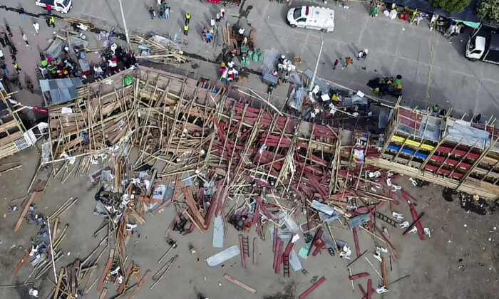 An aerial photograph of a collapsed stand at the bullring in the city of El Espinal, Colombia, southwest of Bogotá, June 26, 2022.  (Samuel Antonio Galindo Campos / AFP via Getty Images)