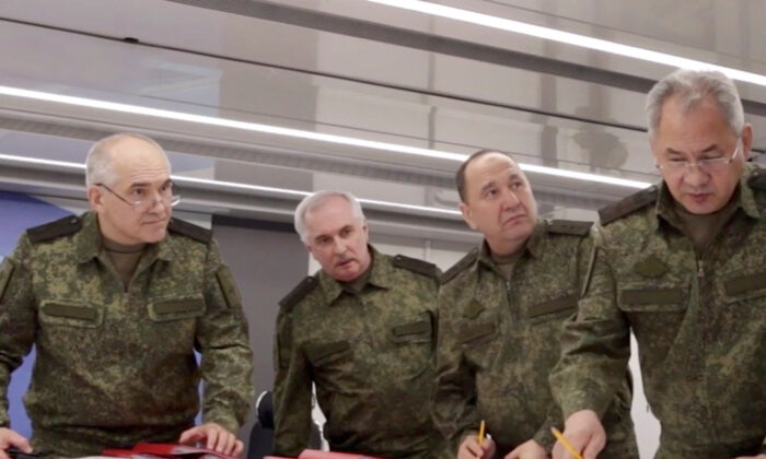 (R–L) Russian Defence Minister Sergei Shoigu, Deputy Defence Minister Colonel General Gennady Zhidko, Chief of the Main personnel directorate of the Russian Defence Ministry Colonel General Viktor Goremykin, Chief of the Main operational directorate of the General Staff of the Russian Armed Forces Colonel General Sergei Rudskoy, are seen at a command post during an inspection of Russian troop units engaged in Ukraine-Russia conflict, in an unknown location, in this still image taken from video released on June 26, 2022. (Russian Defence Ministry/Handout via Reuters)