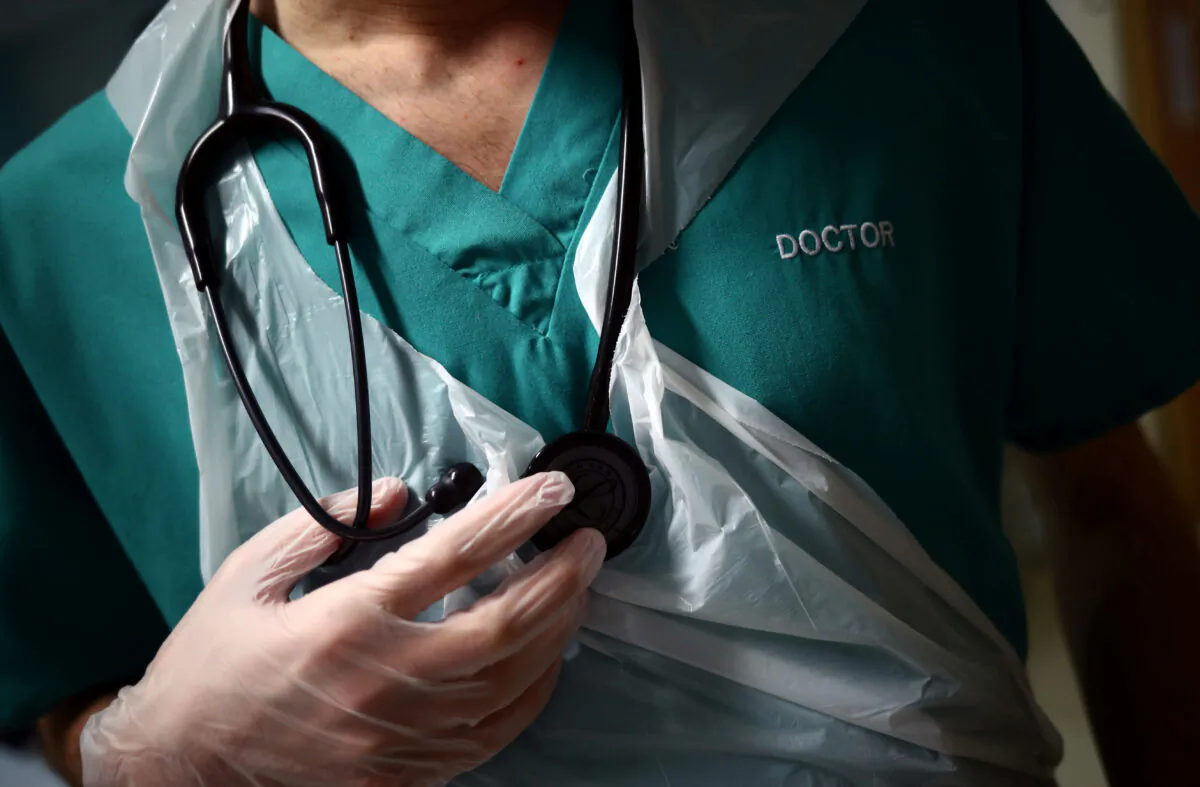 A doctor in Blackburn, England, on May 14, 2020. (Hannah McKay - Pool/Getty Images)