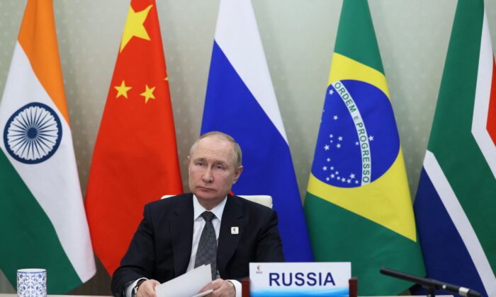 Russian President Vladimir Putin takes part in the XIV BRICS summit in virtual format via a video call, in Moscow, on June 23, 2022. (Mikhail Metzel/Sputnik/AFP via Getty Images)