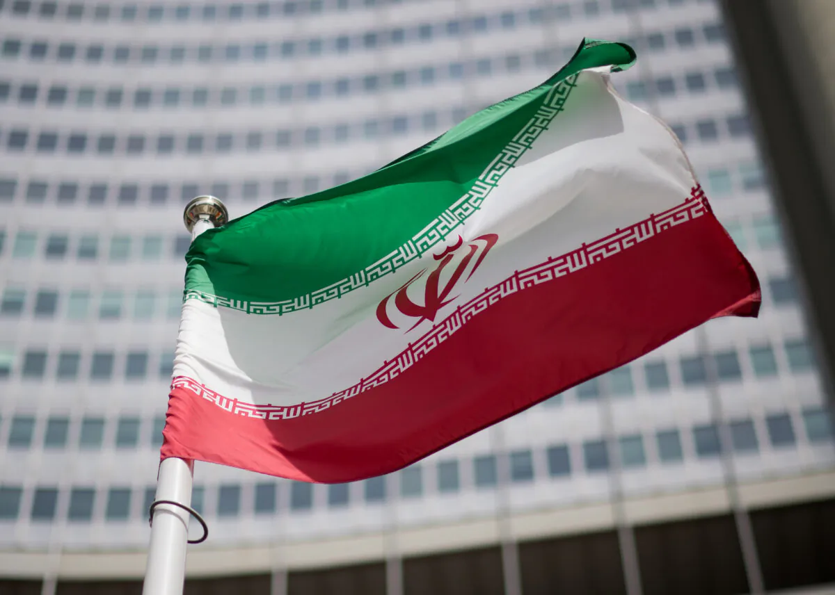 The flag of Iran in front of the building of the International Atomic Energy Agency (IAEA) Headquarters in Vienna on May 24, 2021. (Michael Gruber/Getty Images)