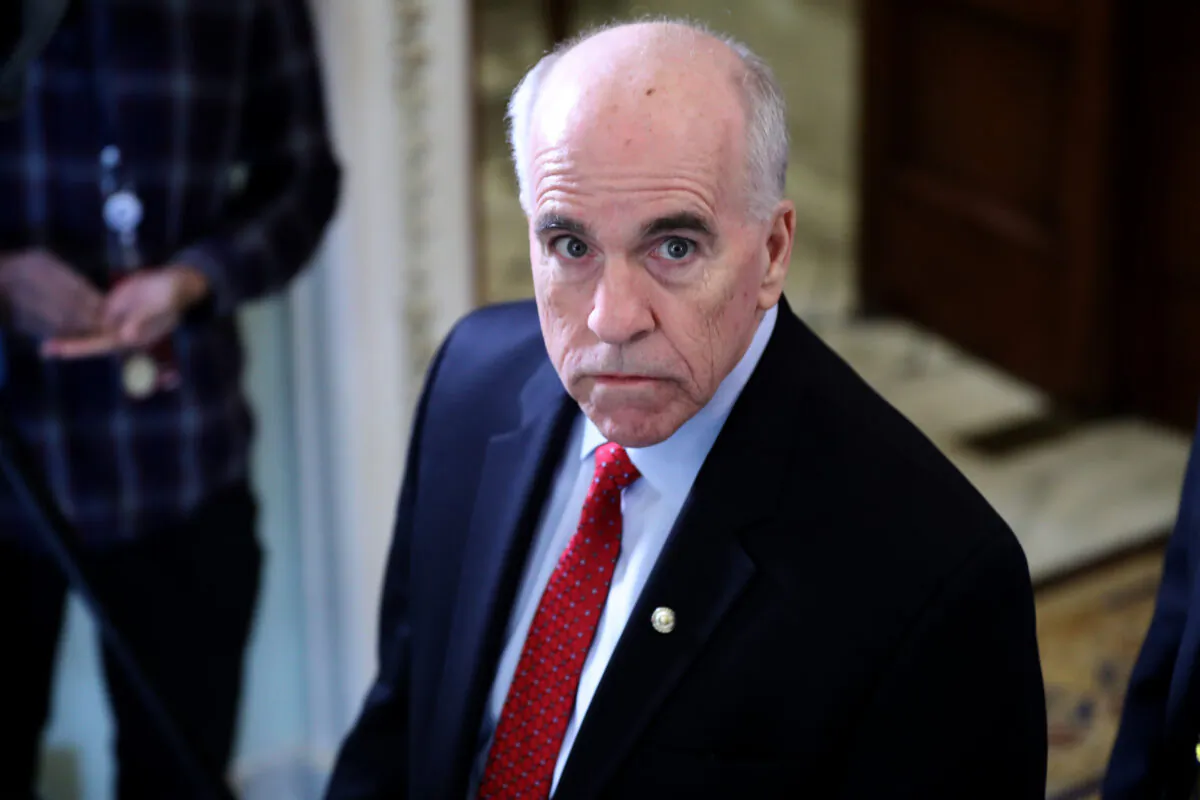 Senate Sergeant at Arms Michael Stenger walks the halls of the U.S. Capitol outside the Senate Chamber during a break in President Donald Trump's impeachment trial on Jan. 22, 2020. (Chip Somodevilla/Getty Images)