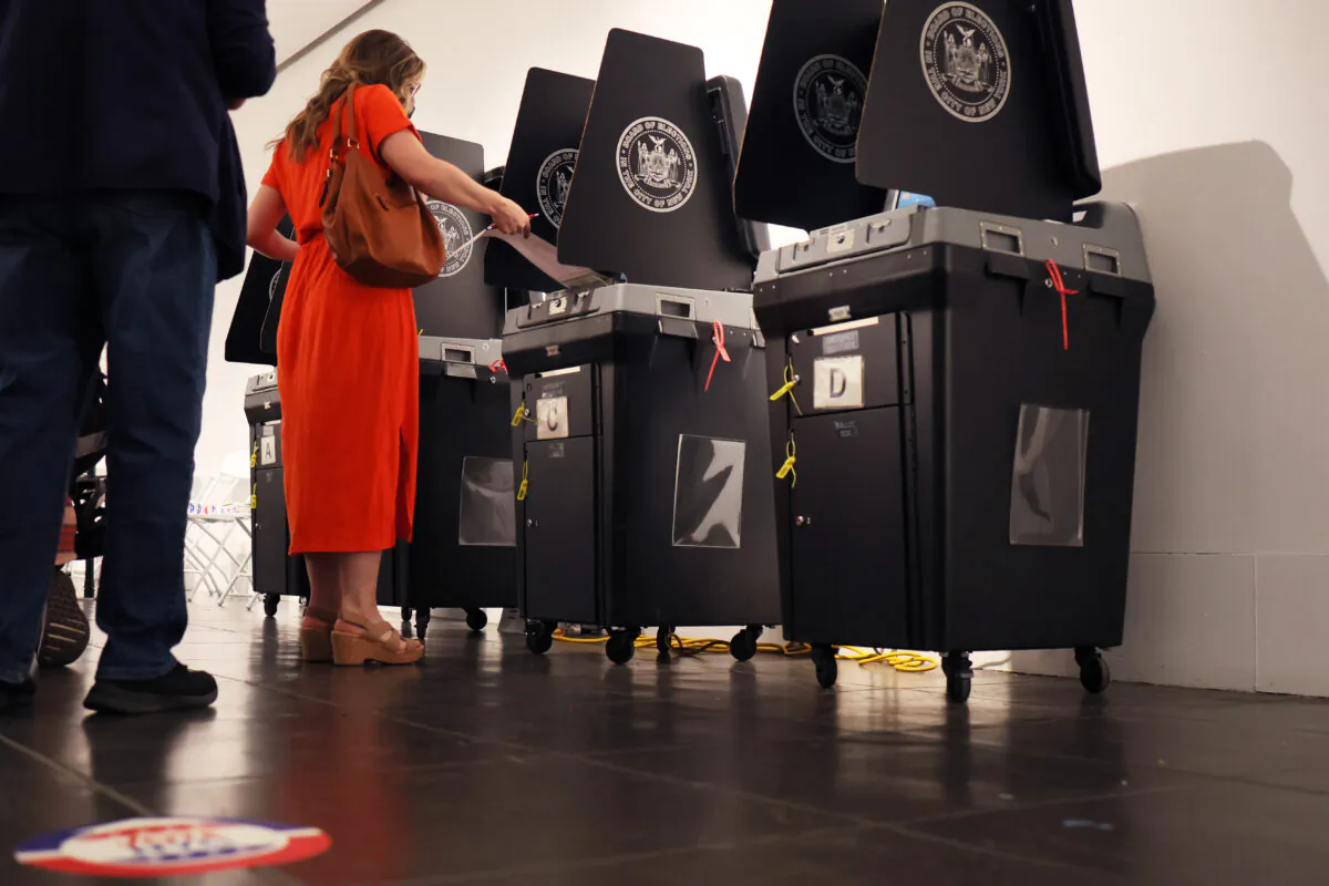 A person casts their voting ballot during the June Primary Election at Brooklyn Museum in New York City, on June 28, 2022. (Michael M. Santiago/Getty Images)