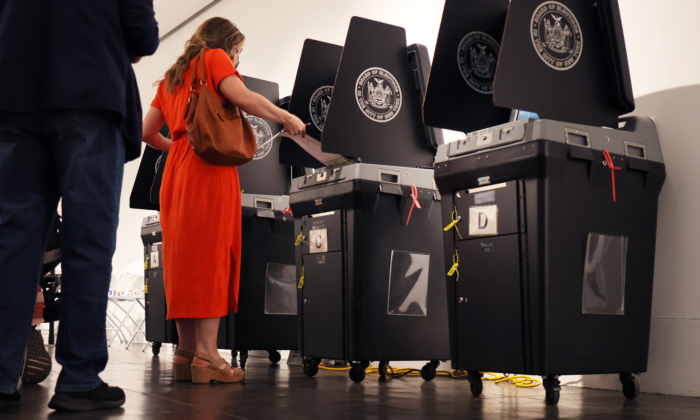 A person casts their voting ballot during the June Primary Election at Brooklyn Museum in N.Y. on June 28, 2022. (Michael M. Santiago/Getty Images)
