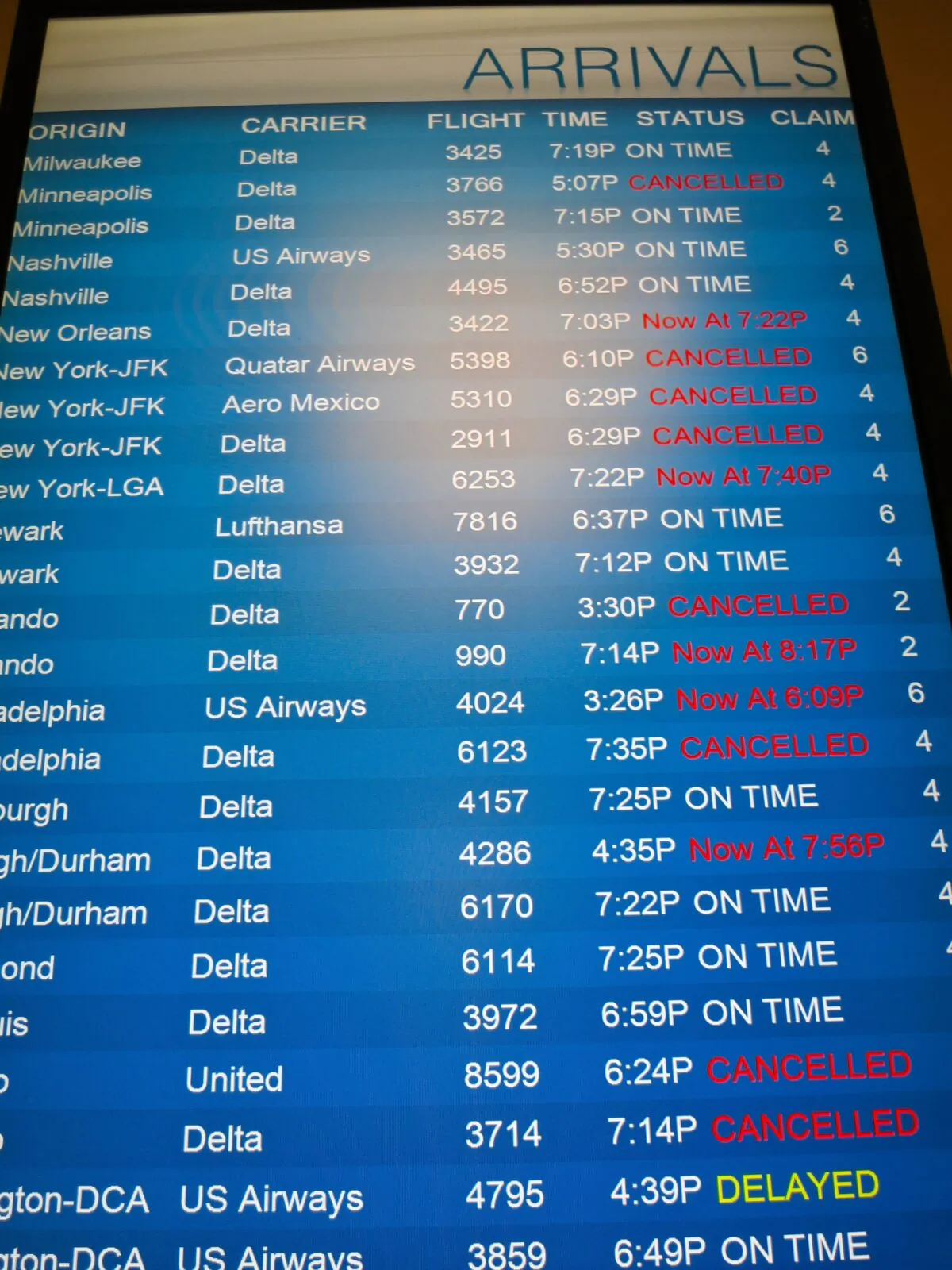 Flight arrivals board showing canceled flights. (Dreamstime)