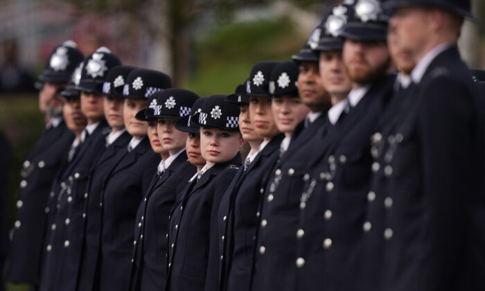 New police recruits await an inspection by Metropolitan Police Commissioner Dame Cressida Dick during a passing out parade in Hendon, London, on April 8, 2022. (PA)