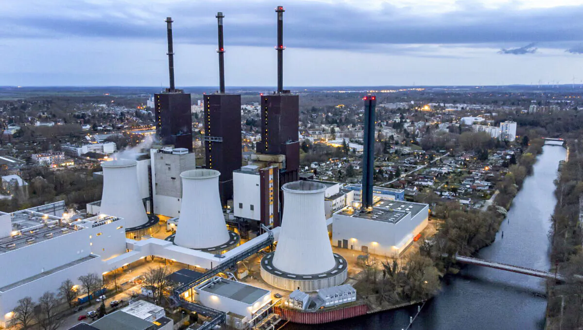 Steam leaves a cooling tower of the Lichterfelde gas-fired power plant in Berlin on March 30, 2022. (Michael Sohn/AP Photo)