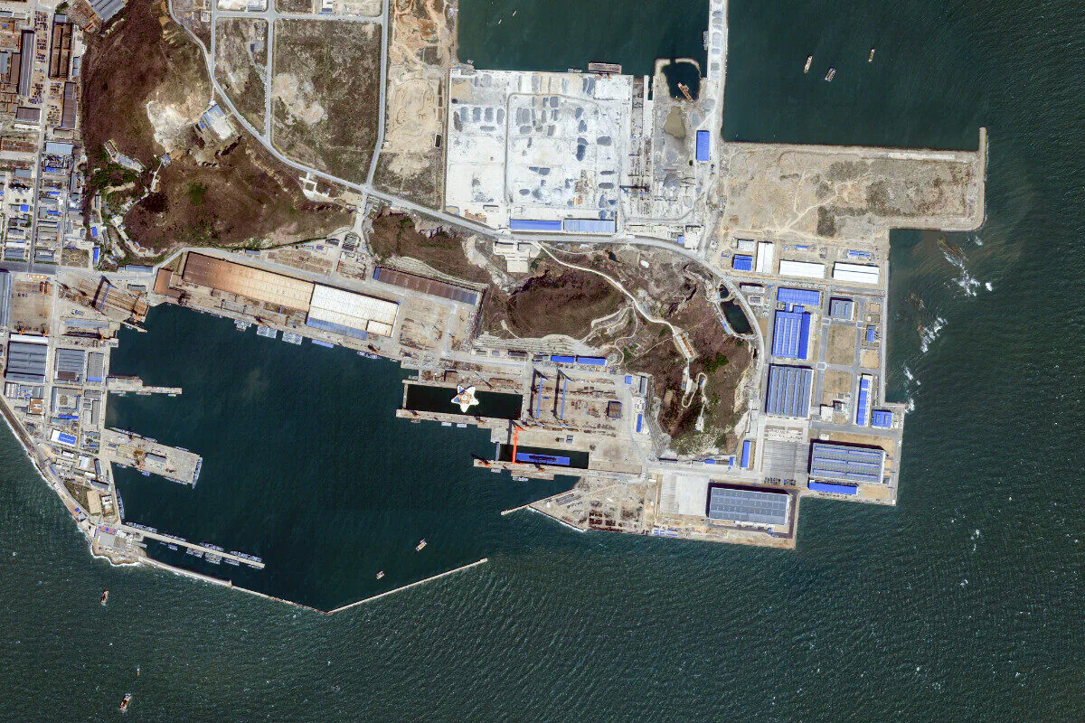 A People's Liberation Army Navy submarine sits in dry dock in Huludao Port in Liaoning province, China. Image captured by Planet Labs PBC, 3 May 2022. (Courtesy of Planet Labs)