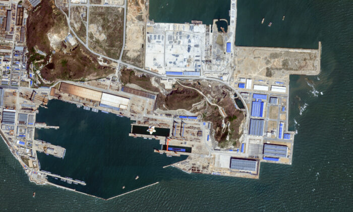 A People's Liberation Army Navy submarine sits in dry dock in Huludao Port in Liaoning province, China. Image captured by Planet Labs PBC, 3 May 2022. (Courtesy of Planet Labs)