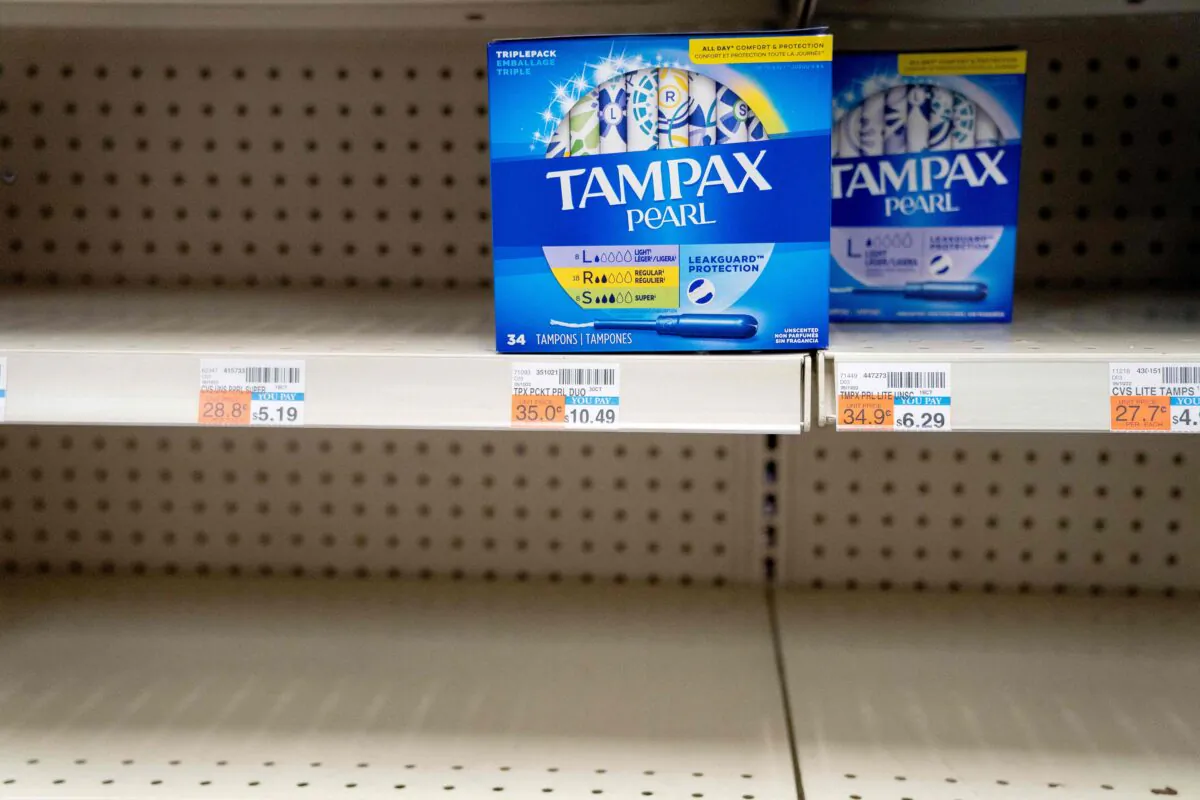 Two remaining boxes of Tampax tampons are seen on a shelf at a store in Washington, D.C., on June 14, 2022. (Stefani Reynolds/AFP via Getty Images)