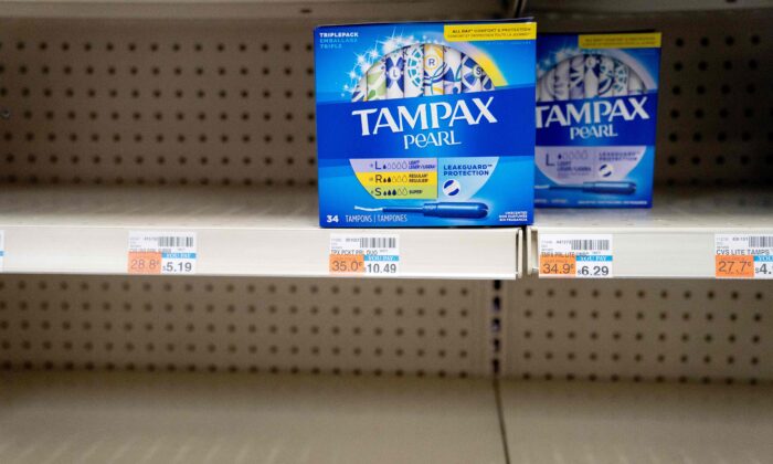 Two remaining boxes of Tampax tampons are seen on a shelf at a store in Washington, D.C., on June 14, 2022. (Stefani Reynolds/AFP via Getty Images)