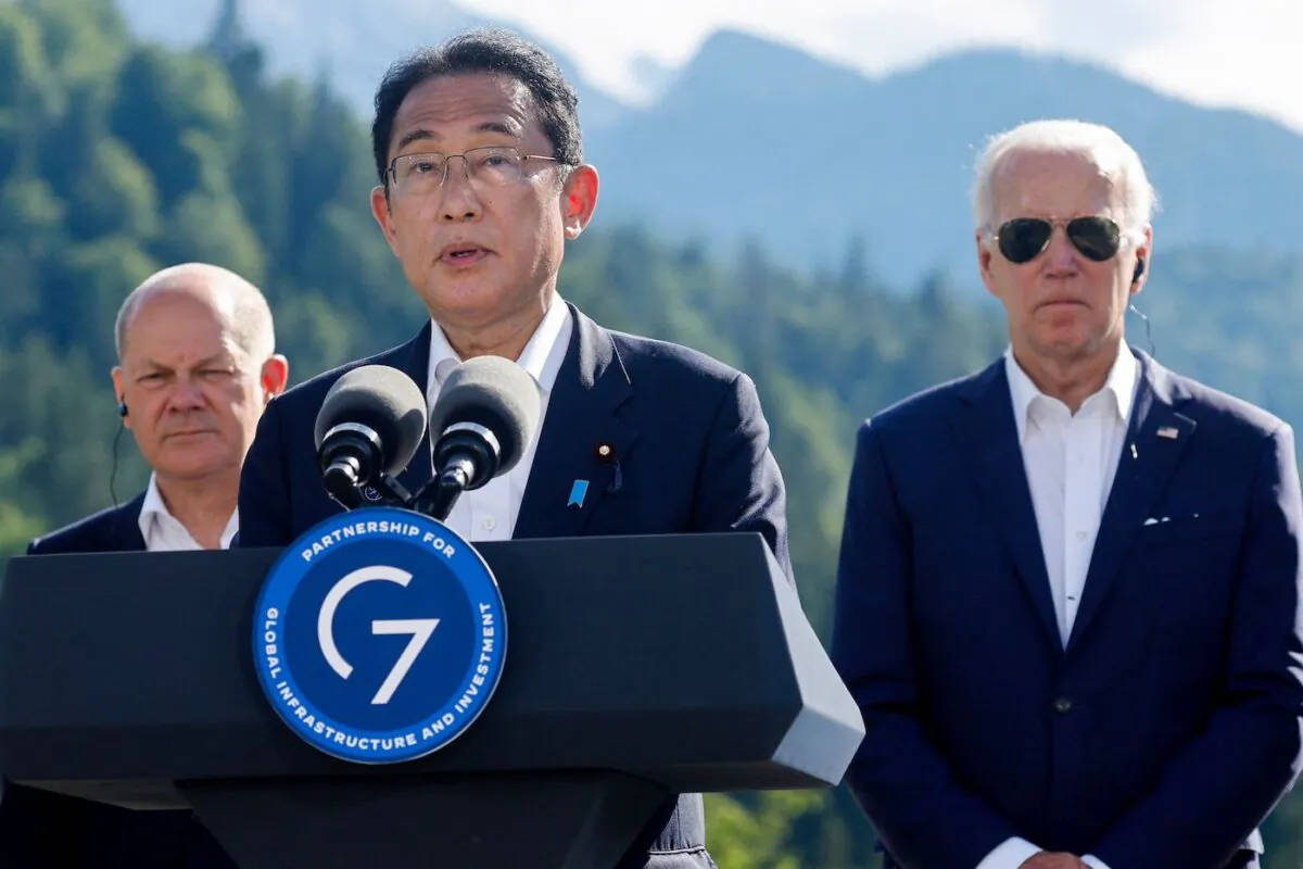 Japan's Prime Minister Fumio Kishida addresses a press conference next to German Chancellor Olaf Scholz and U.S. President Joe Biden during the G-7 Summit at Elmau Castle, southern Germany, on June 26, 2022. (Jonathan Ernst/AFP via Getty Images)