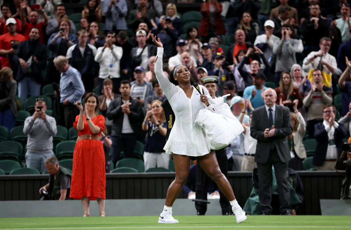 Serena Williams of The United States waves to the crowd after losing against Harmony Tan of France during their Women's Singles First Round Match on day two of The Championships Wimbledon 2022 at All England Lawn Tennis and Croquet Club, in London, on June 28, 2022. (Clive Brunskill/Getty Images)