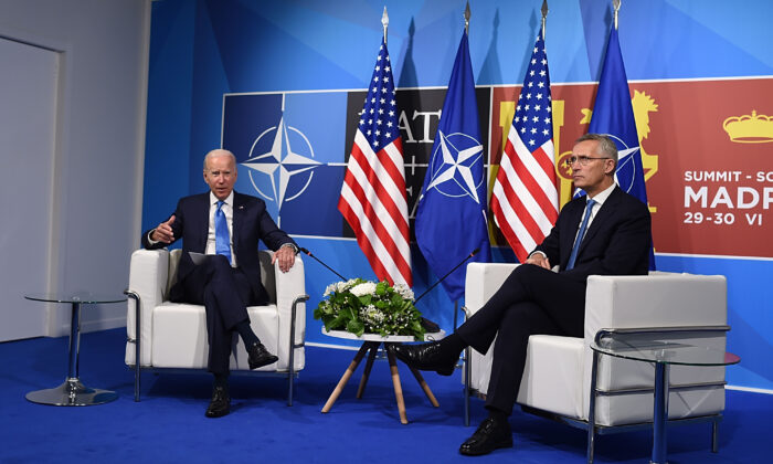 President Joe Biden (L) meets with NATO Secretary-General Jens Stoltenberg at the NATO Summit in Madrid, Spain, on June 29, 2022. (Denis Doyle/Getty Images)