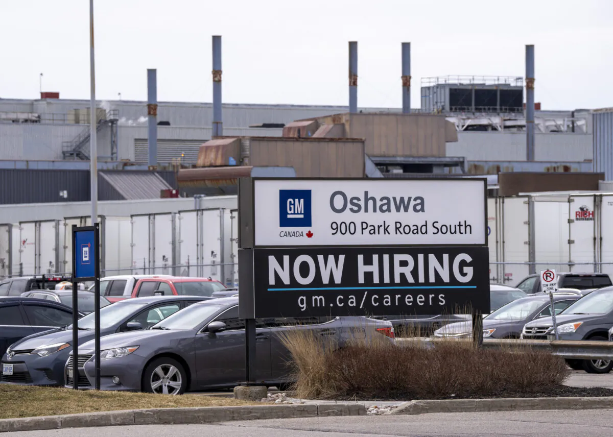 A sign announcing hiring at the General Motors facility in Oshawa, Ont., on April 4, 2022. (The Canadian Press/Frank Gunn)