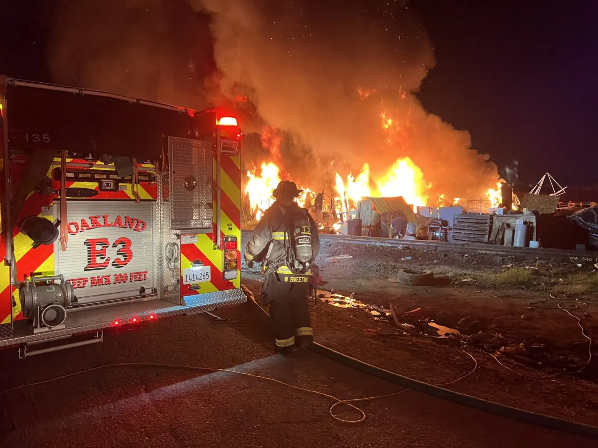 Oakland firefighters responding to a fire on Wood Street in Oakland, California on March 1, 2022 (Courtesy Oakland Fire Department)