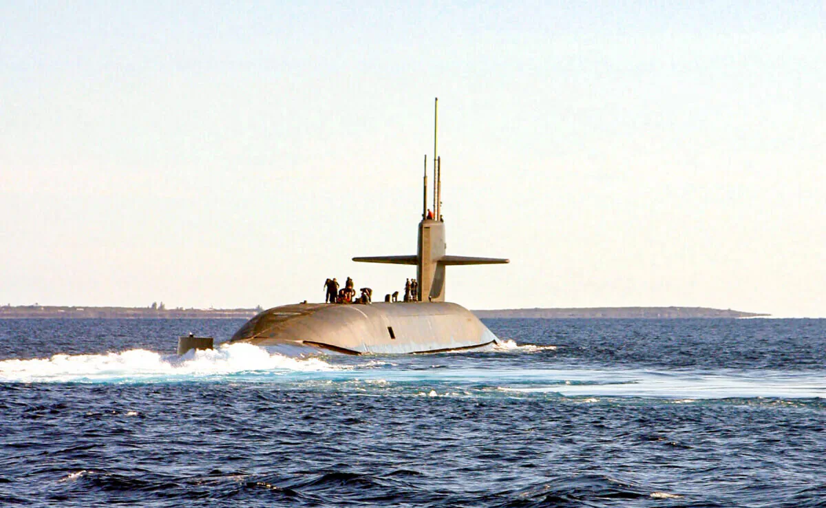 A nuclear propulsion Ohio class submarine, the USS Florida sails  on Jan. 22, 2003 off the coast of the Bahamas. Australia as part of the AUKUS deal will get the tech for nuclear powered subs. (David Nagle/U.S. Navy/Getty Images)