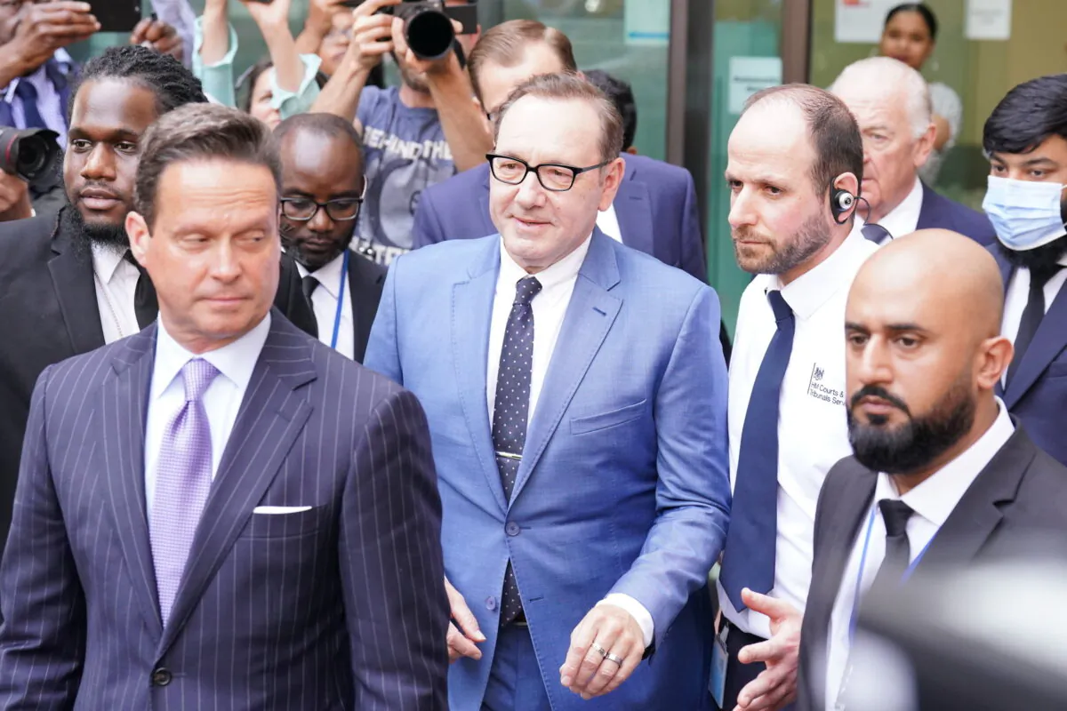 Actor Kevin Spacey (centre) outside Westminster Magistrates Court in London on June 16, 2022. (Jonathan Brady/PA)