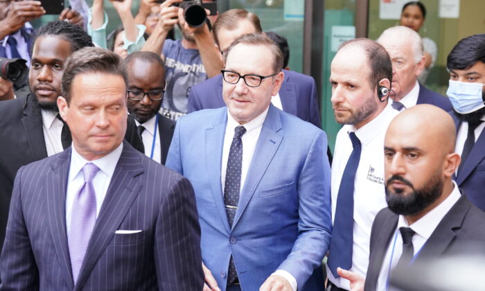 Actor Kevin Spacey (centre) outside Westminster Magistrates Court in London on June 16, 2022. (Jonathan Brady/PA)