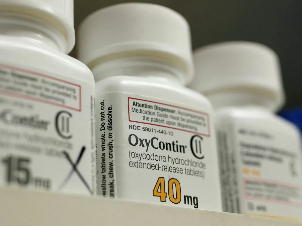 Bottles of prescription painkiller OxyContin made by Purdue Pharma LP sit on a shelf at a local pharmacy in Provo, Utah, on April 25, 2017.  (George Frey/Reuters)