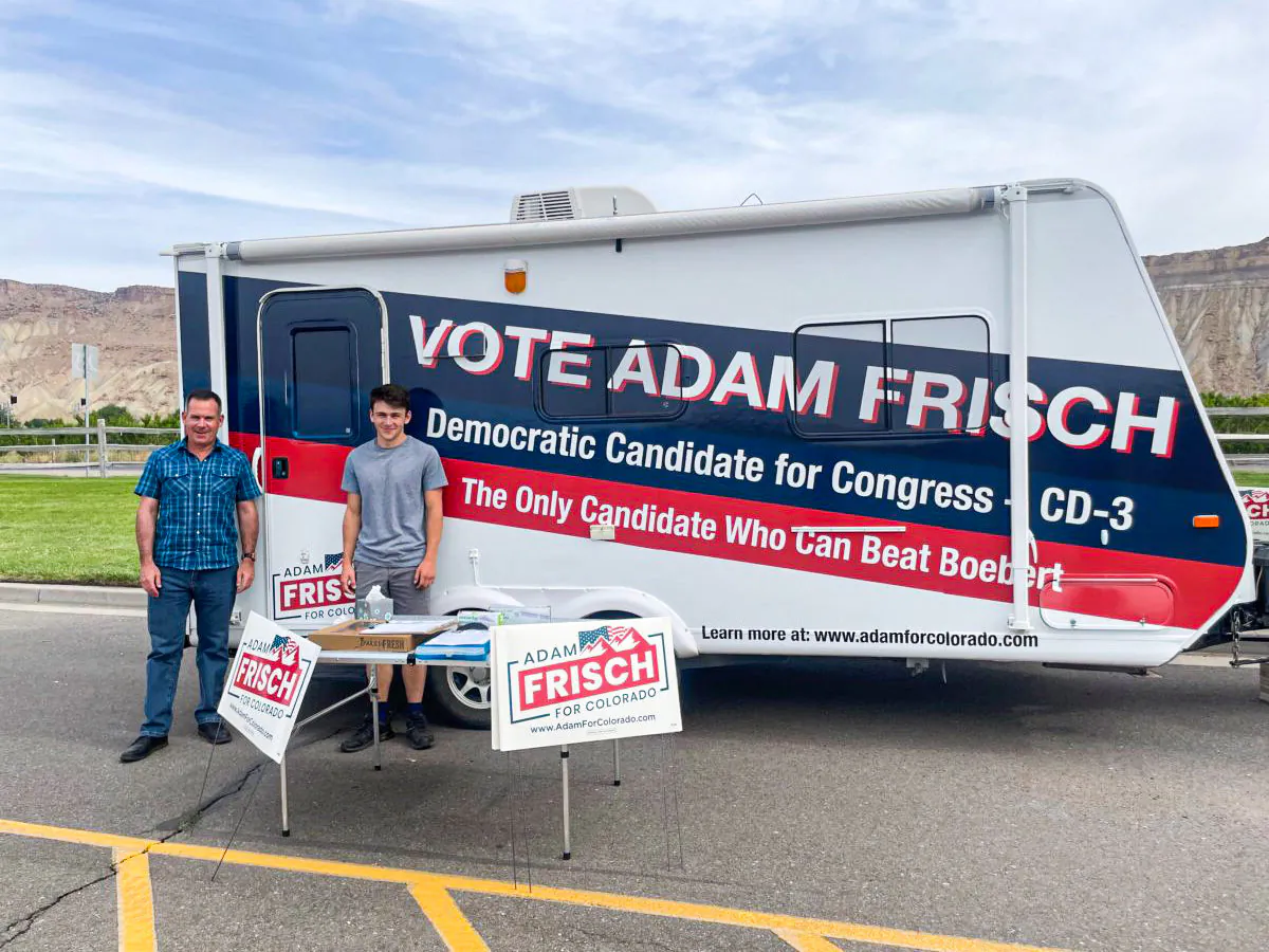 Adam Frisch (L), a Democratic candidate for Congress, and his 16-year-old son, Felix, make a stop on an 1,800-mile trek to visit 56 communities across Colorado in the last week before the June 28, 2022 primary. (Courtesy of Adam Frisch)