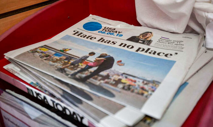 The front page of a USA Today newspaper is seen at a convenience store in Washington on Aug. 6, 2019. (Alastair Pike/AFP via Getty Images)