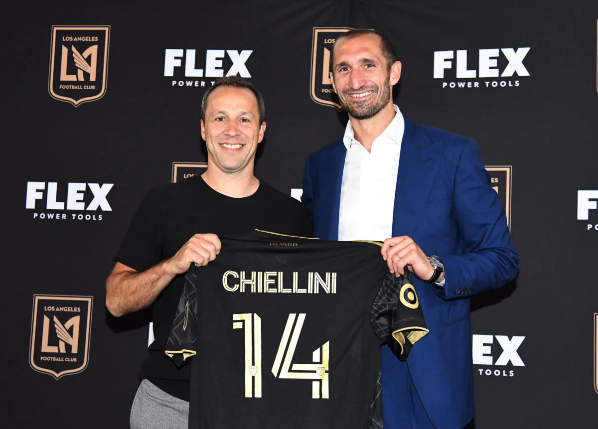 Defender Giorgio Chiellini (R) poses with head coach Steven Cherundolo after Chiellini was introduced by Los Angeles Football Club during a news conference at Banc of California Stadium, in Los Angeles, on June 29, 2022. (Kevork Djansezian/Getty Images)