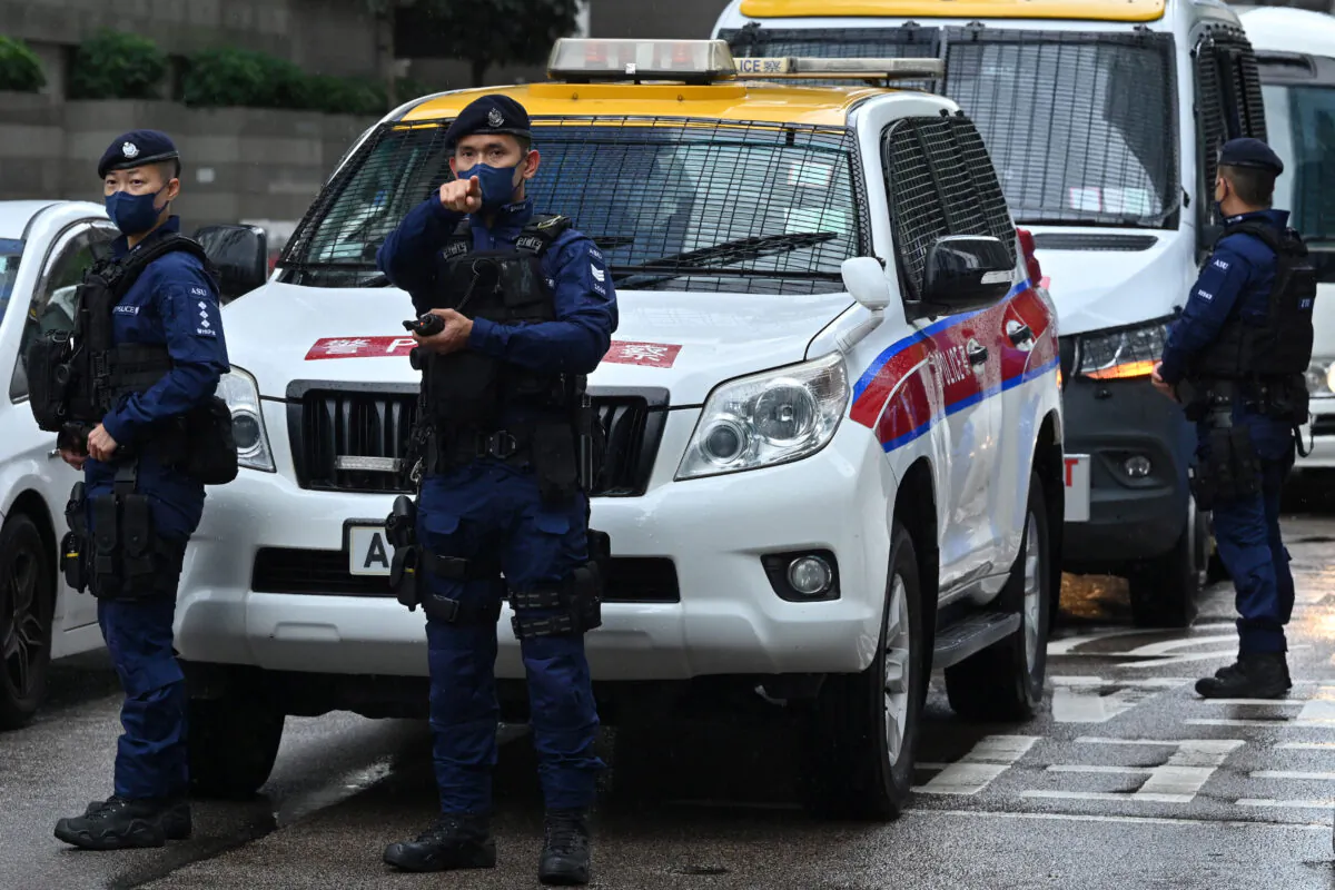 A special unit of the Hong Kong police provides security in the city's Wanchai district on June 30, 2022. (Peter Parks/AFP via Getty Images)