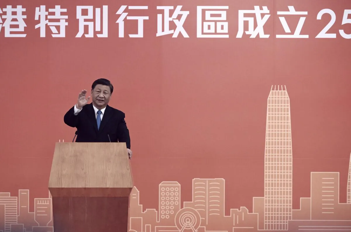 China's leader Xi Jinping gestures as he speaks upon his arrival via high-speed rail in Hong Kong on June 30, 2022. (Selim Chtayti/POOL/AFP via Getty Images)