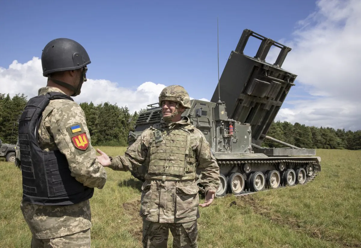 British army personnel teach members of the Ukrainian armed forces how to operate a multiple-launch rocket systems, on Salisbury Plain, Wiltshire, England, on June 25, 2022. (PA Media)