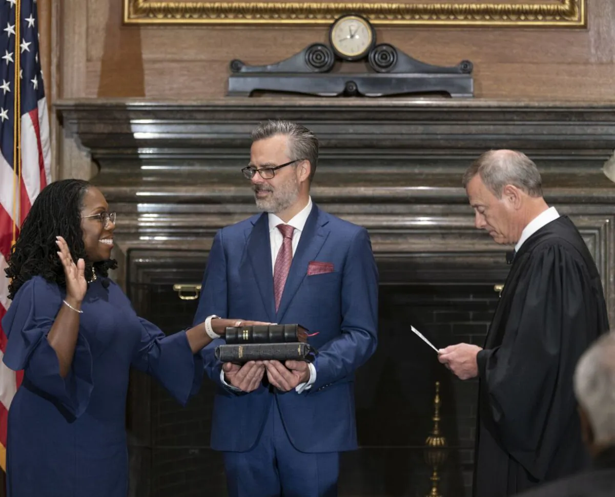 In this handout provided by the Supreme Court, Chief Justice John G. Roberts, Jr. (R) administers the Constitutional Oath to Judge Ketanji Brown Jackson (L) in the West Conference Room of the Supreme Court in Washington, on June 30, 2022. (Fred Schilling/Collection of the Supreme Court of the United States via Getty Images)